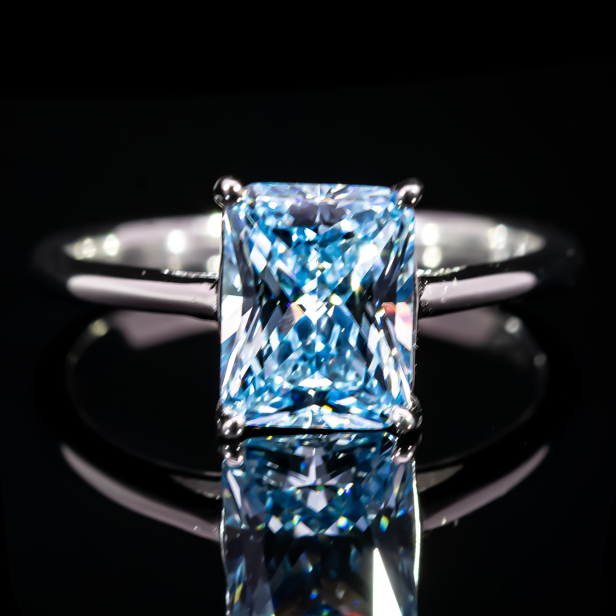 Dolce Mondo Luxe Blue Radiant Cut Solitaire Ring in 925 Silver with Premium Zircon Stone