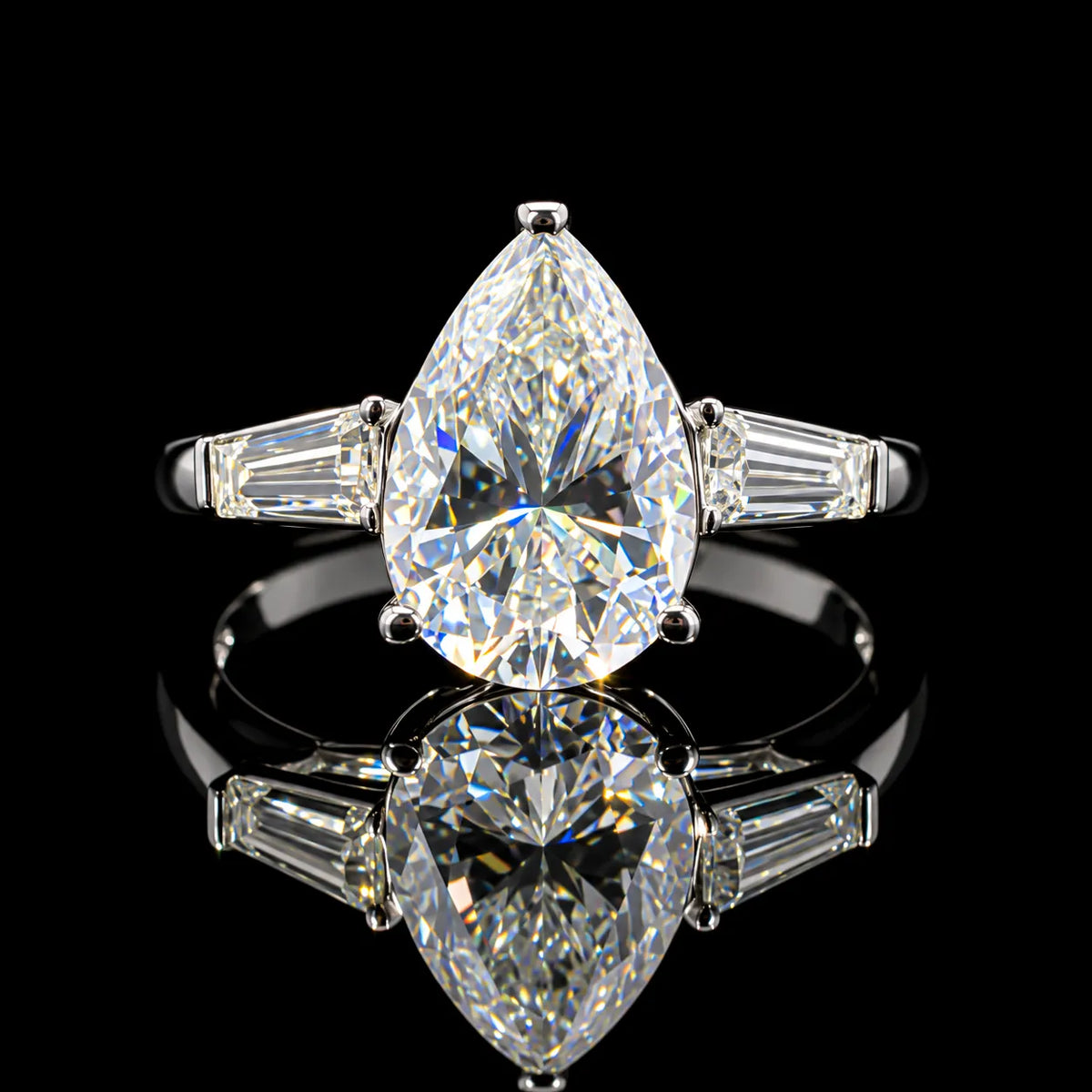 Pear Cut Three Stone GRA Certified Moissanite Ring in Rhodium Plated 925 Sterling Silver – 3.38 Carat