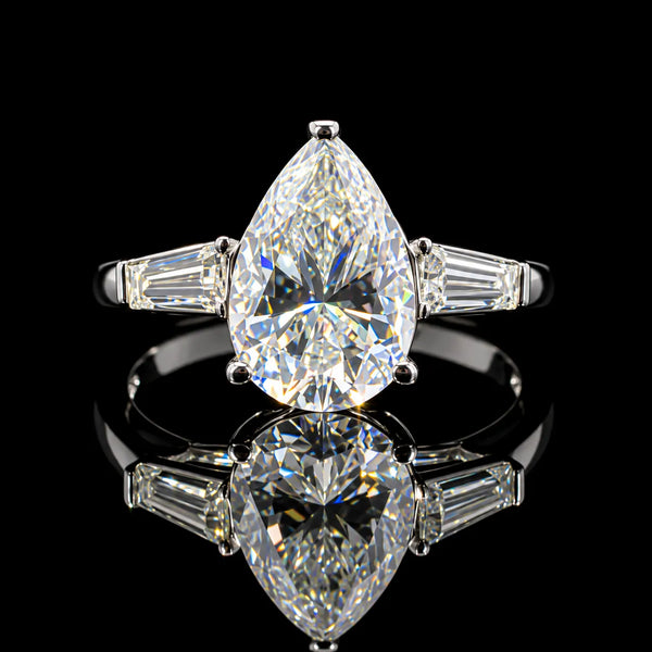 Pear Cut Three Stone GRA Certified Moissanite Ring in Rhodium Plated 925 Sterling Silver – 3.38 Carat