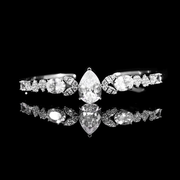 Pear Centre Rhodium Plated Bangle In High Quality Zircon Stone